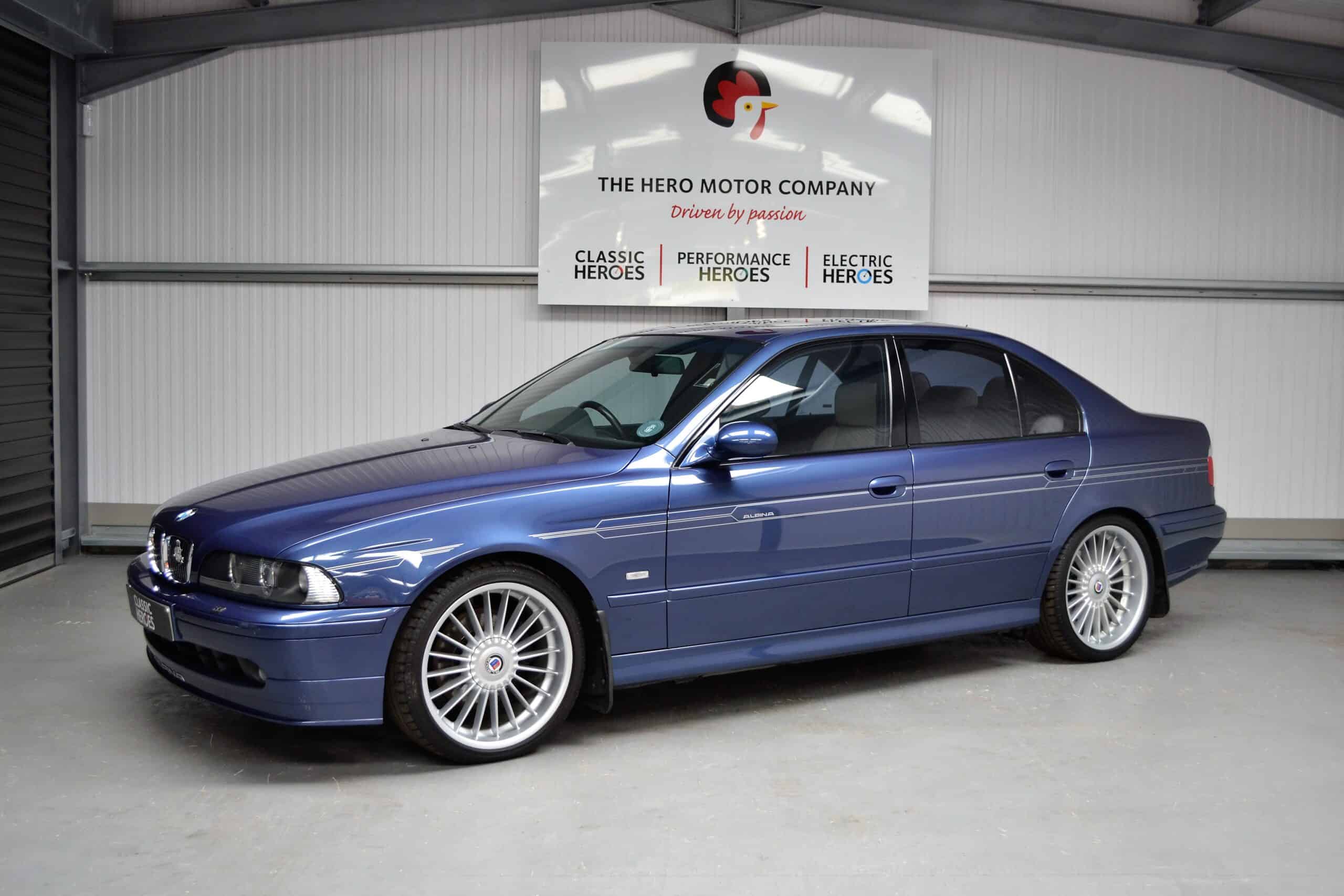 Nearside exterior of Alpina B10 V8 alloy wheels and high gloss shadow trim.