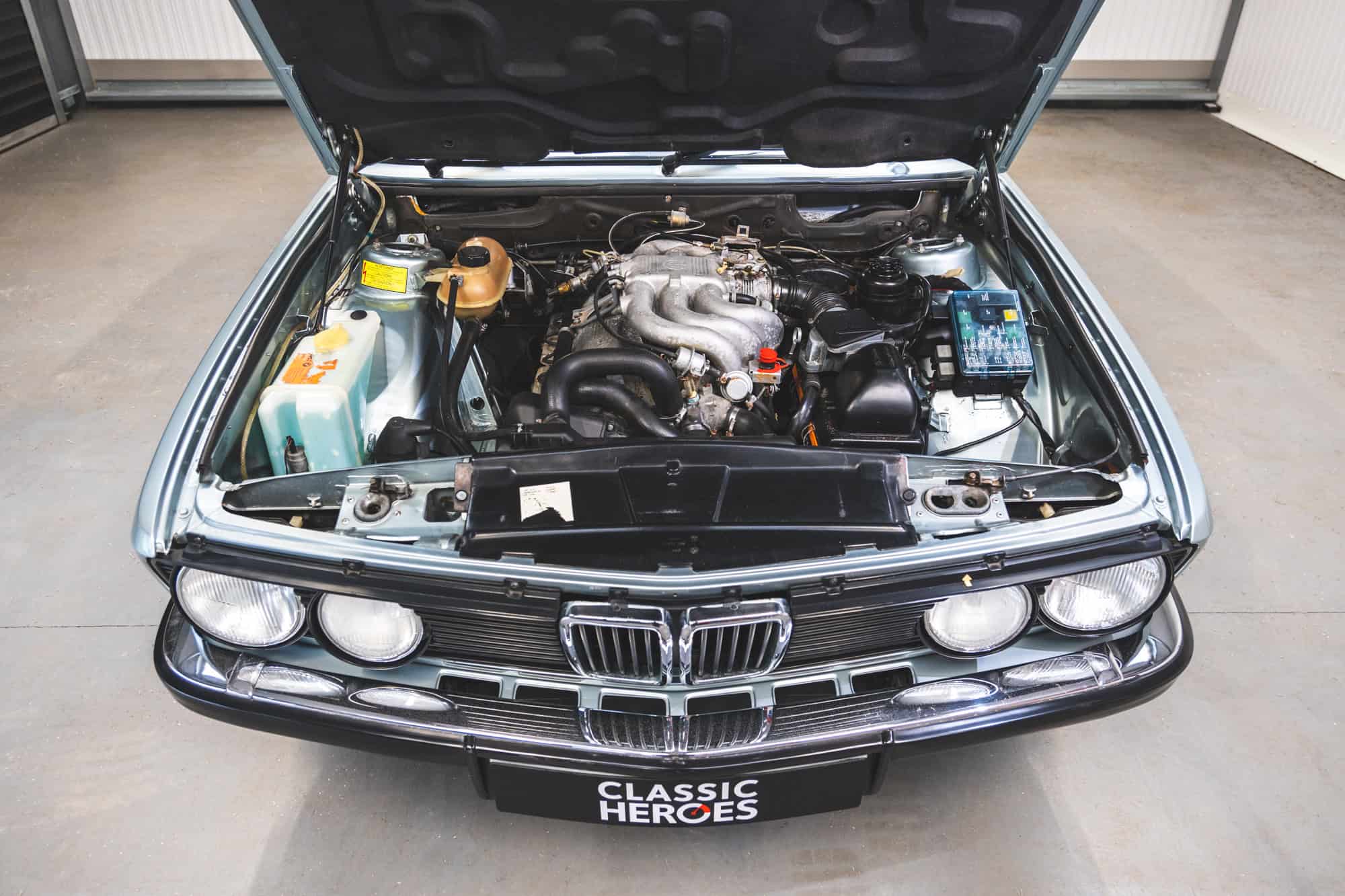 Top down view of a BMW E28 525 Eta engine bay.