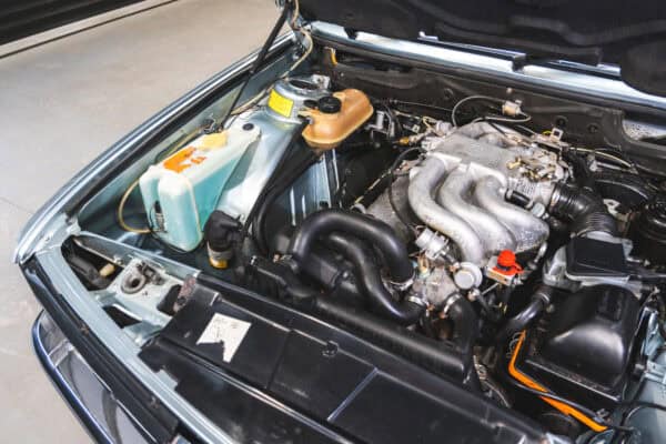 Close up detail of the engine bay of a BMW E28 525 Eta.