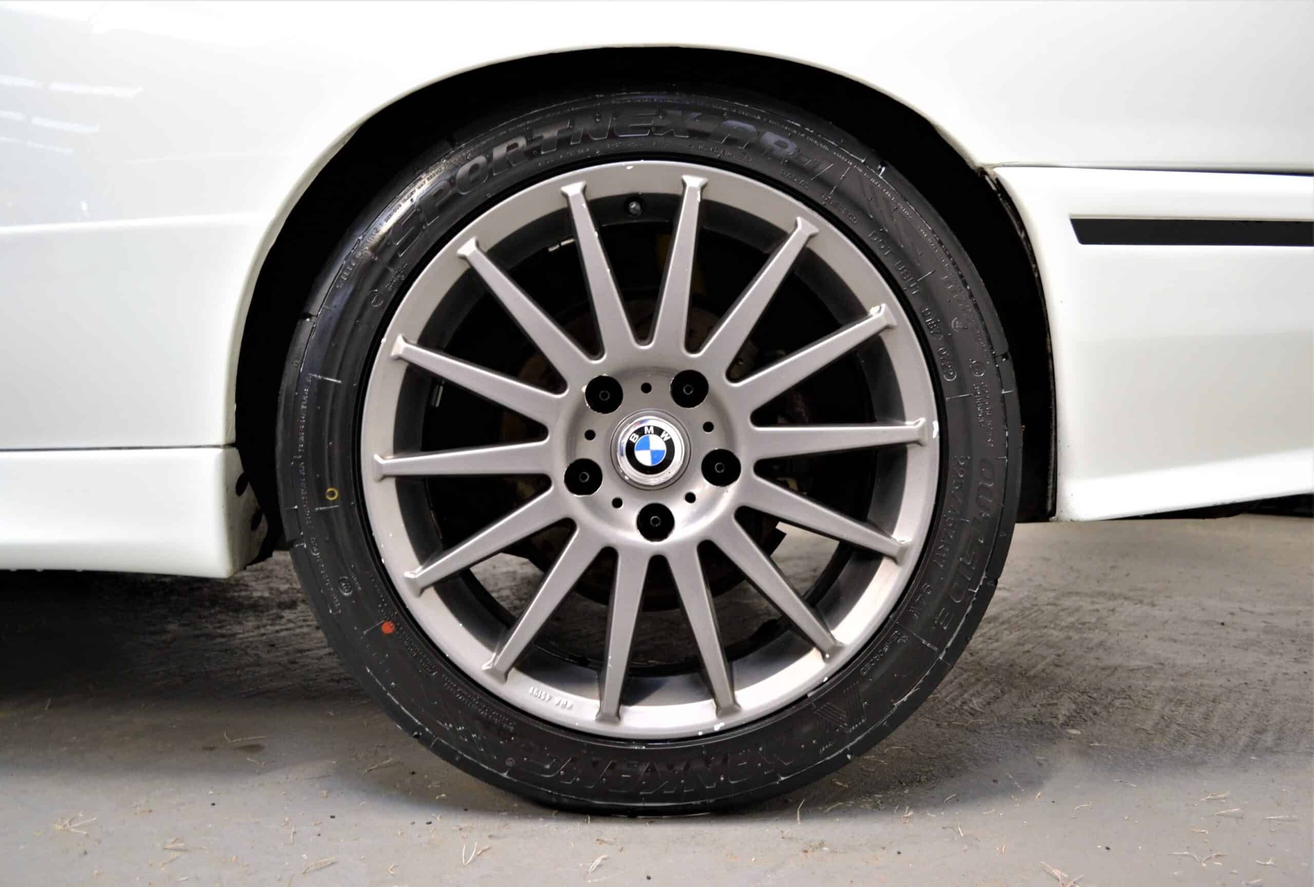 E30 M3 Track Day 17 inch alloy wheels and white exterior.