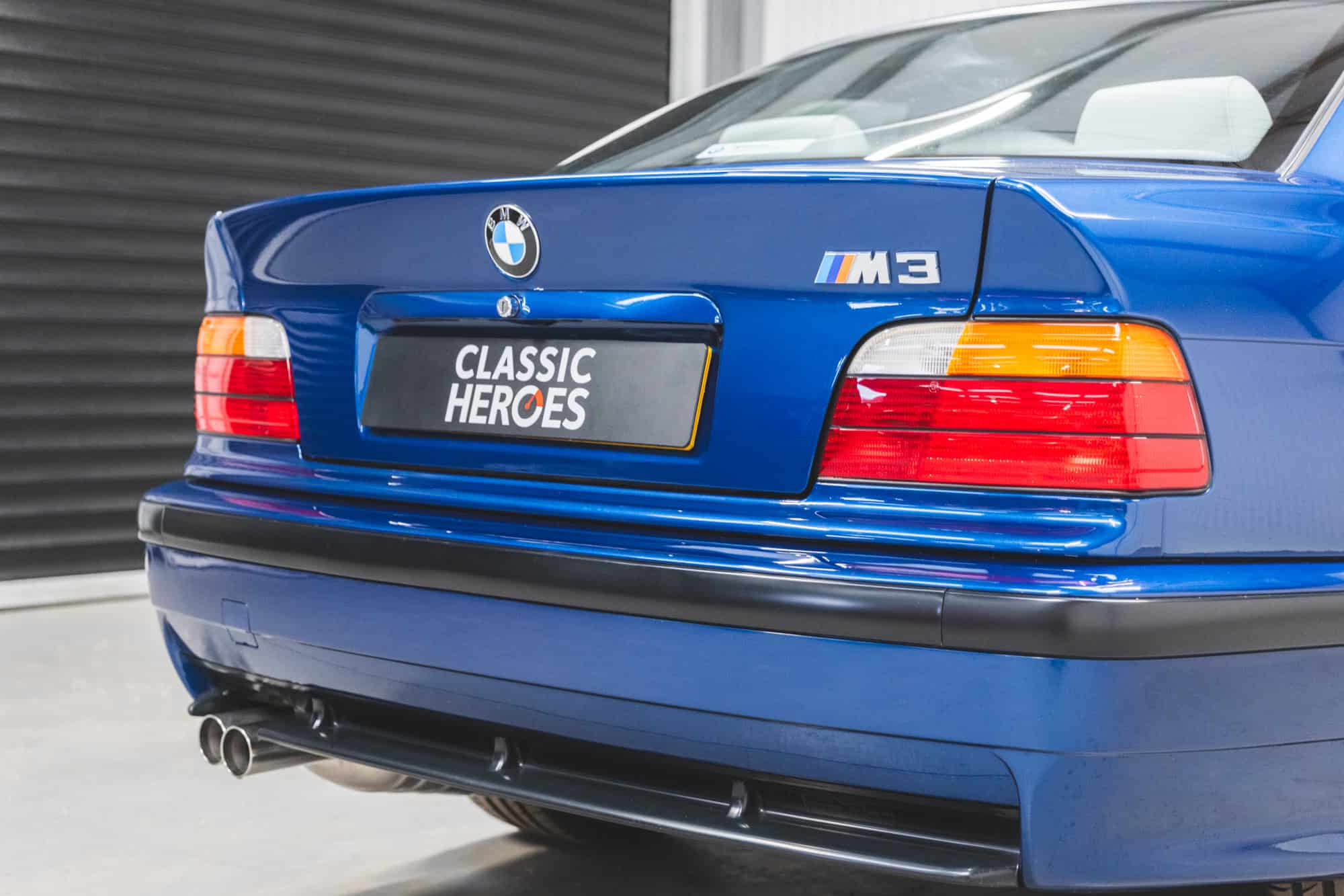 Offside rear quarter of Avus Blue BMW E36 M3 3.0 litre coupe.