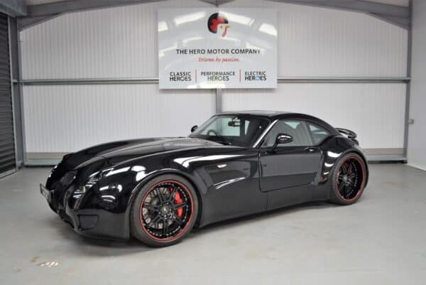 Nearside exterior of Wiesmann MT5 GT in Piano Black and 20 inch BBS wheels.