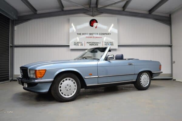 Nearside angle of 300SL Diamond Blue and chrome trim. Mercedes at Hero Motor Company.