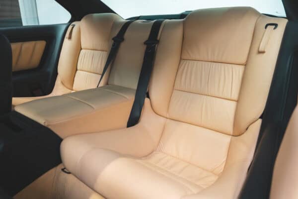 BMW E31 840 Ci sport coupe passenger side rear seats in Sand Beige Leather.