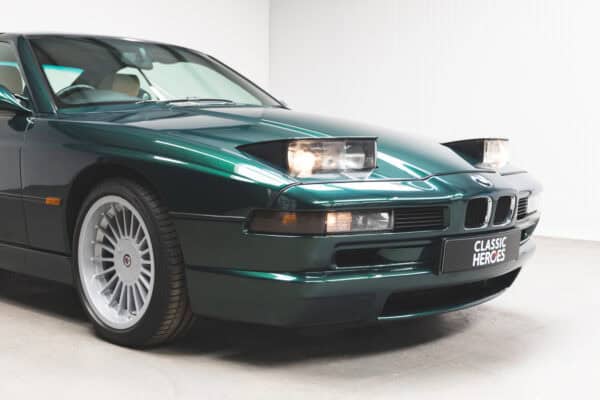 Offside front quarter view of a BMW E31 840 Ci sport coupe pop up headlights.