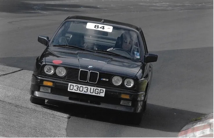 BMW M3 driven on a race track.