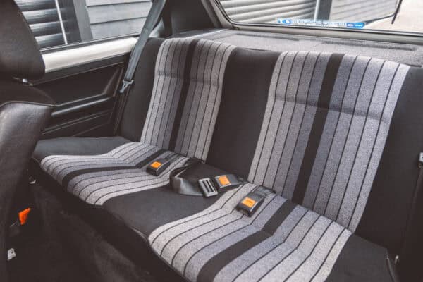 Rear seats and cloth interior of Golf GTI MK1.