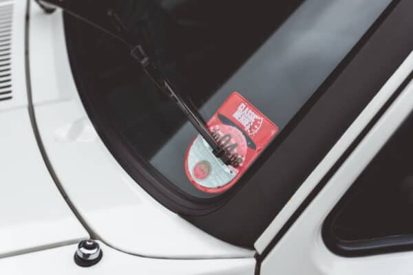 Tax disc on the windscreen of a Golf GTI MK1.