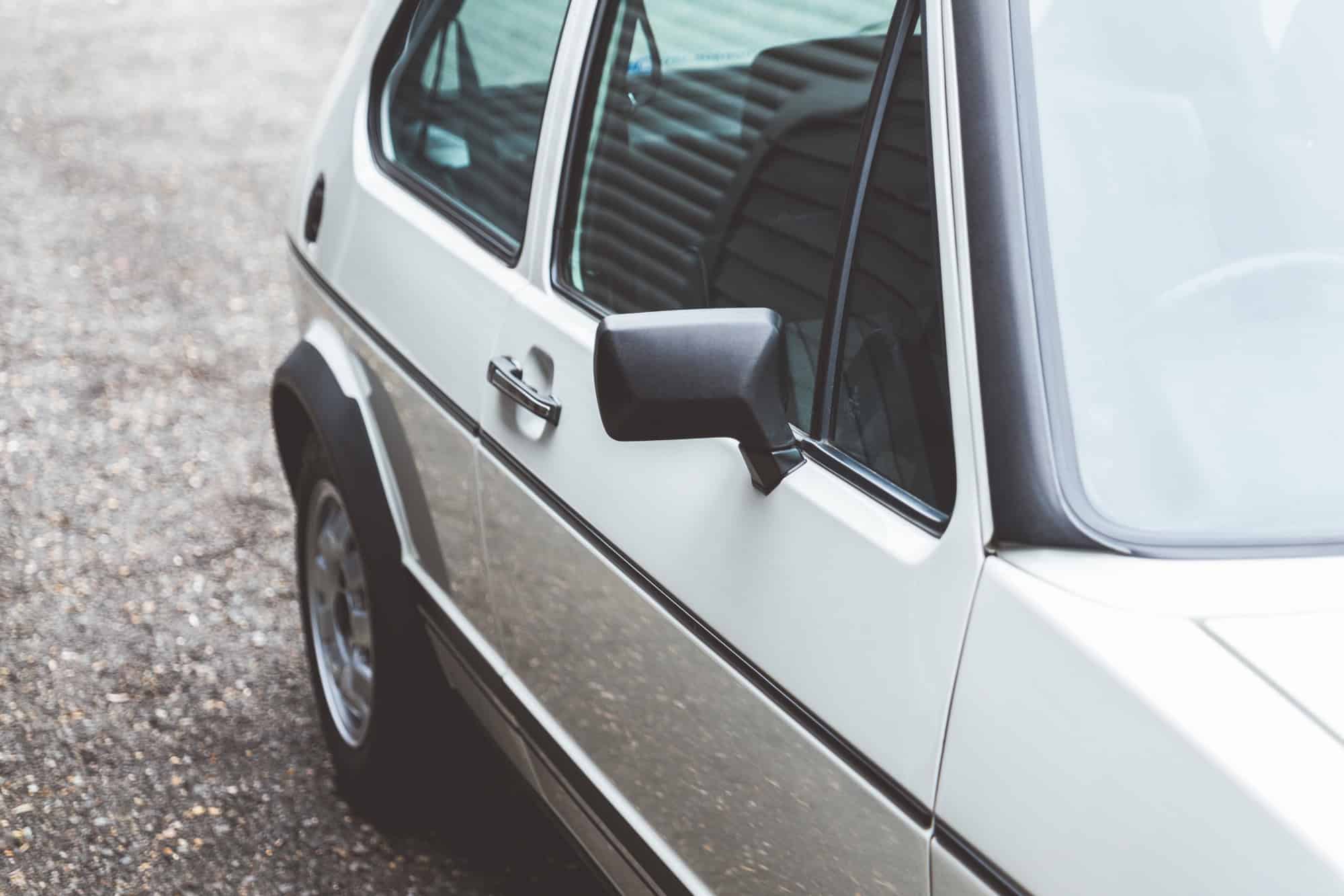 Offside exterior with wing mirror on Golf GTI MK1.