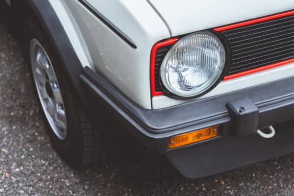 Offside headlight on Golf GTI MK1.