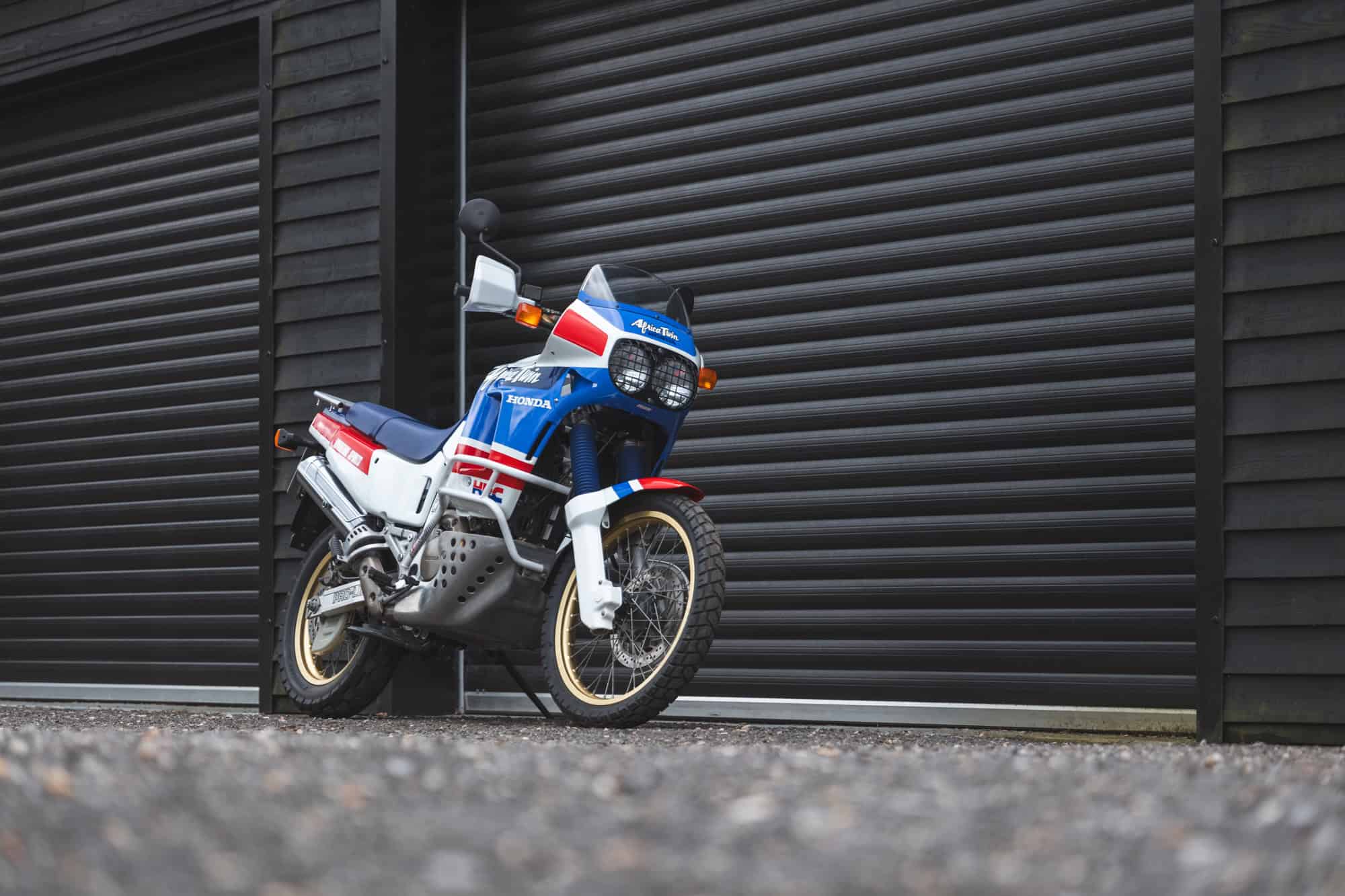 Side exterior view of Honda Africa Twin on kick stand.