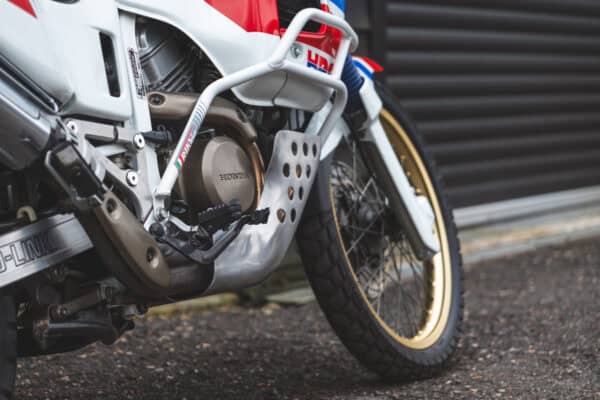 Front wheel and partial body on Honda Africa Twin.