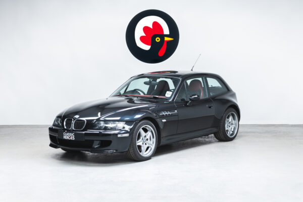 Nearside exterior showing alloy wheels and headlamps on BMW E36 Z3 M Coupe Sapphire Black.