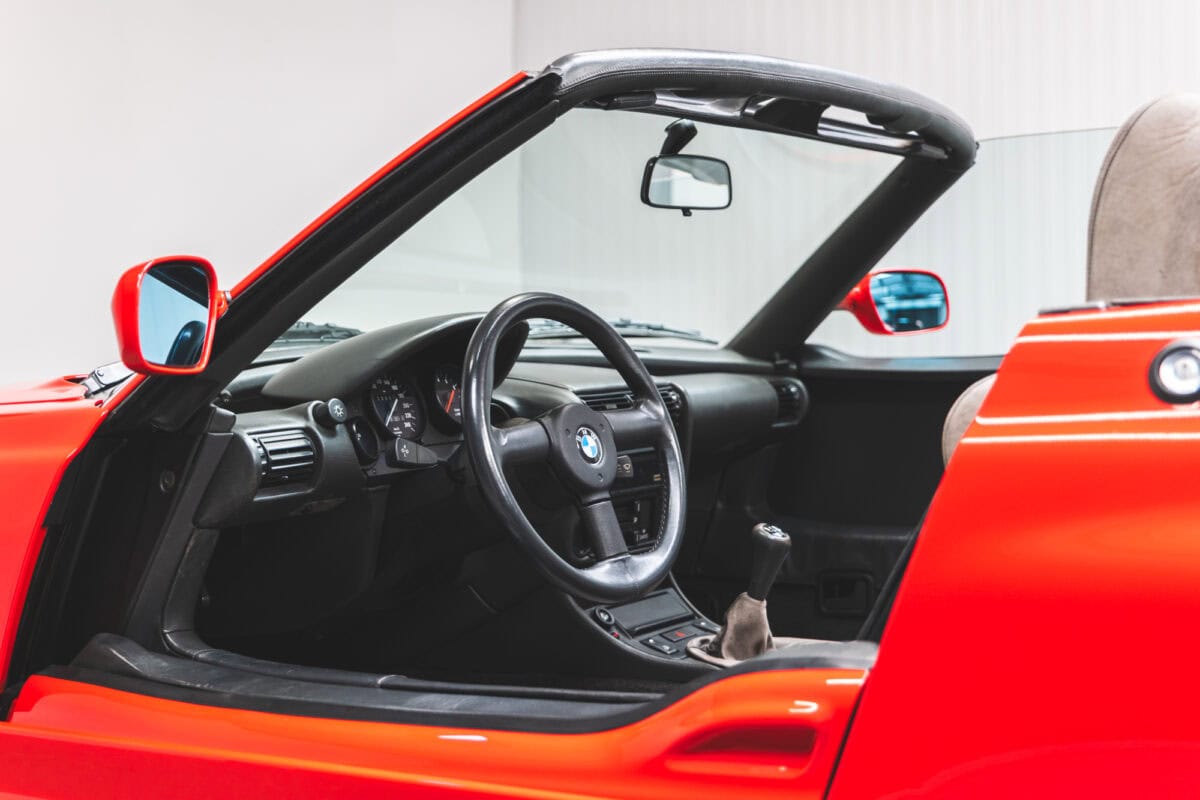 Nearside view into Top Red Z1 with dropped doors and roof down.