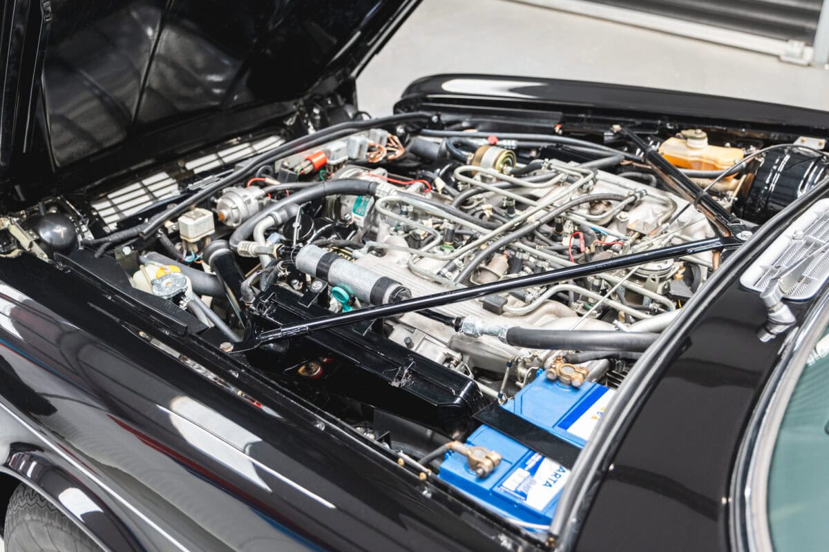 Engine bay of black gloss Jaguar XJC V12 Coupe Sports Saloon.