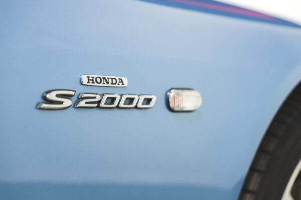 Close up view of Nurburgring Blue Metallic Honda S2000 badge.