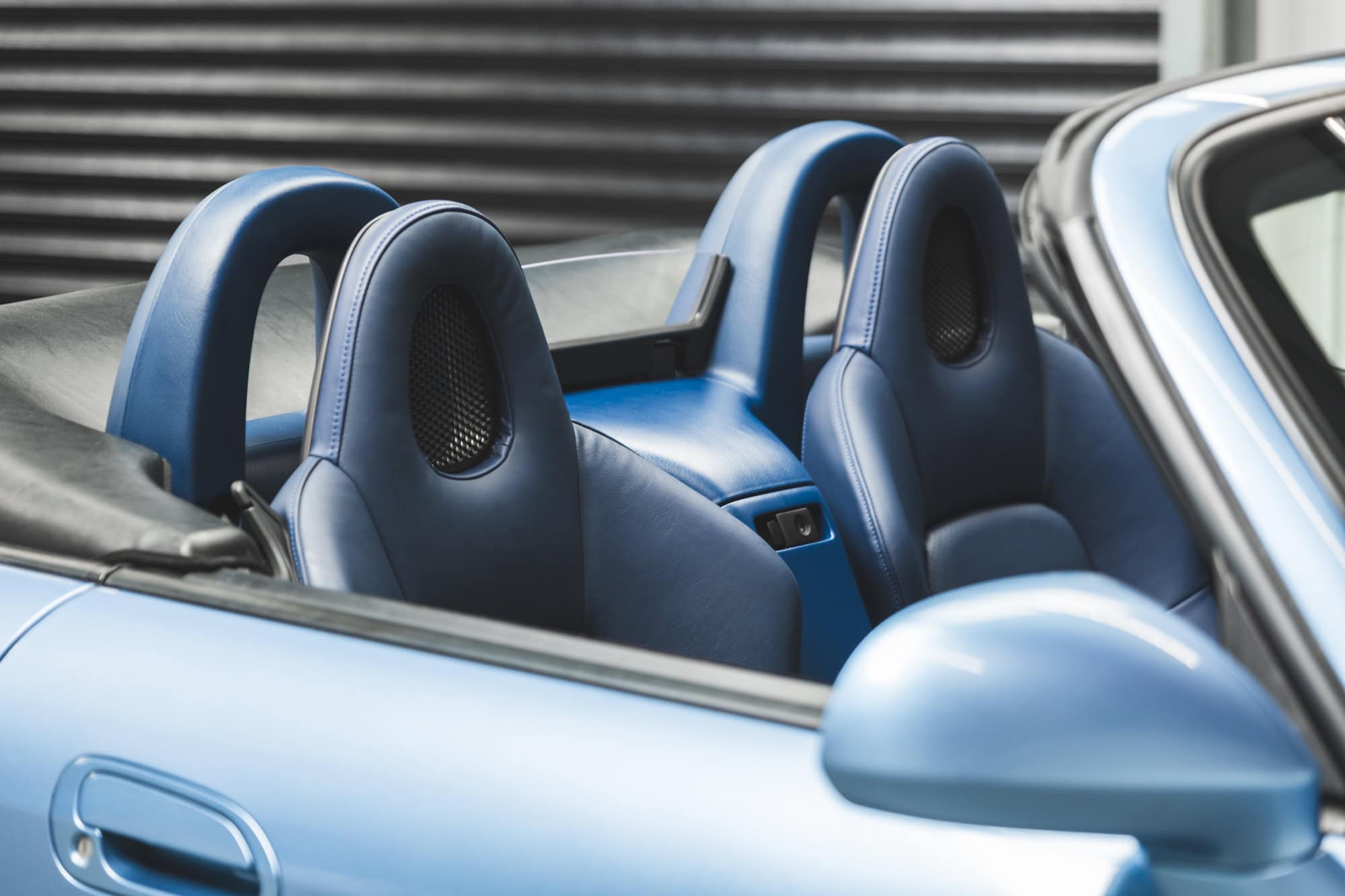 Suzuka Blue Leather Interior on Honda 2000 with the roof down.