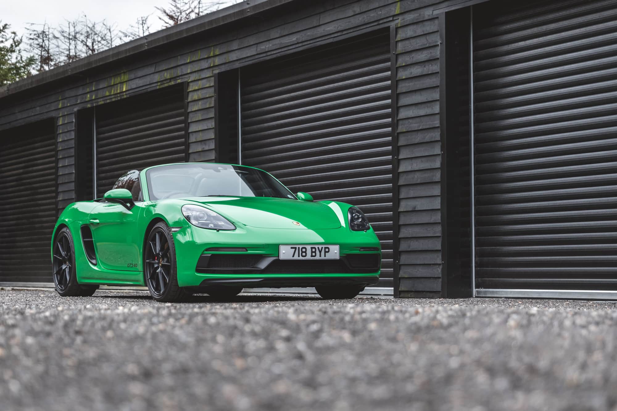 Offside exterior of Porsche Boxster 718 Spyder GTS Python Green.