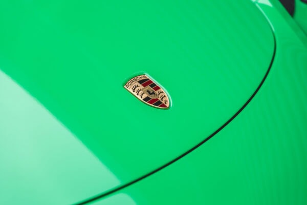 Porsche badge on Porsche Boxster 718 Spyder GTS Python Green.