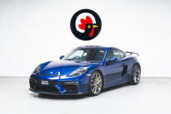 Front exterior of Porsche Cayman 718 GT4 Gentian Blue.