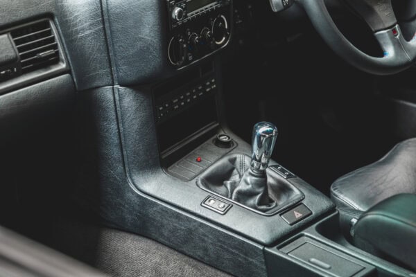 Gearstick and black leather interior on BMW E36 M3 Avus Blue Metallic.