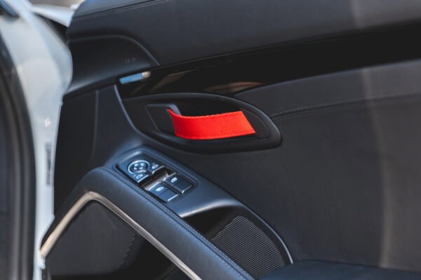 Red fabric door handle on Porsche 991 Carrera T.