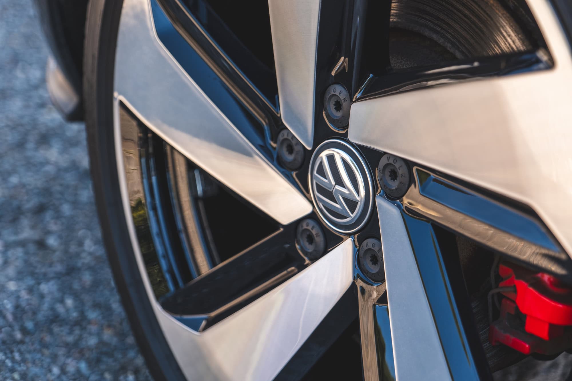 A Volkswagen Golf GTI refurbished diamond cut alloy wheel.