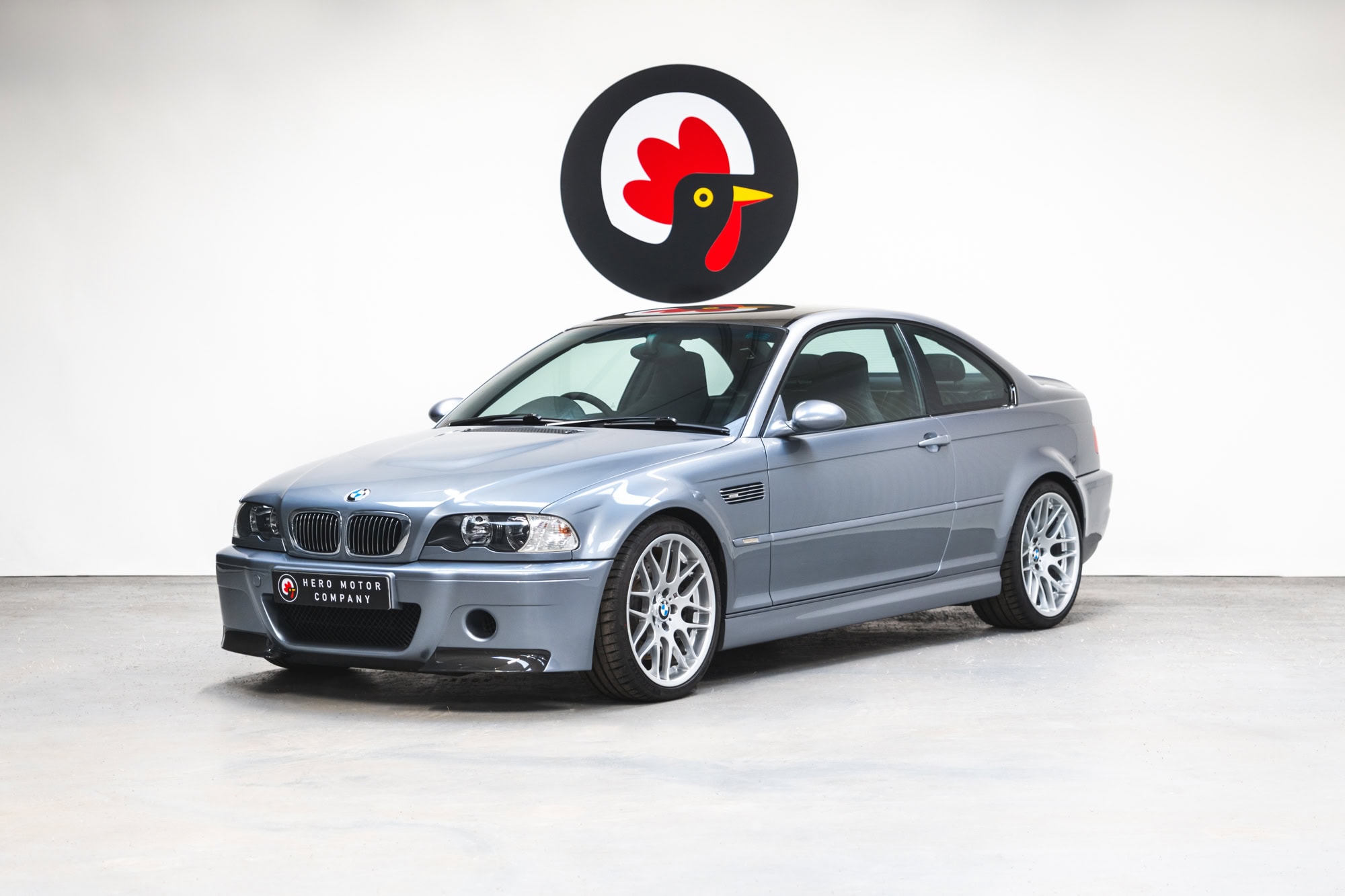 Front nearside quarter view of a BMW E46 M3 CSL in silbergrau metallic.