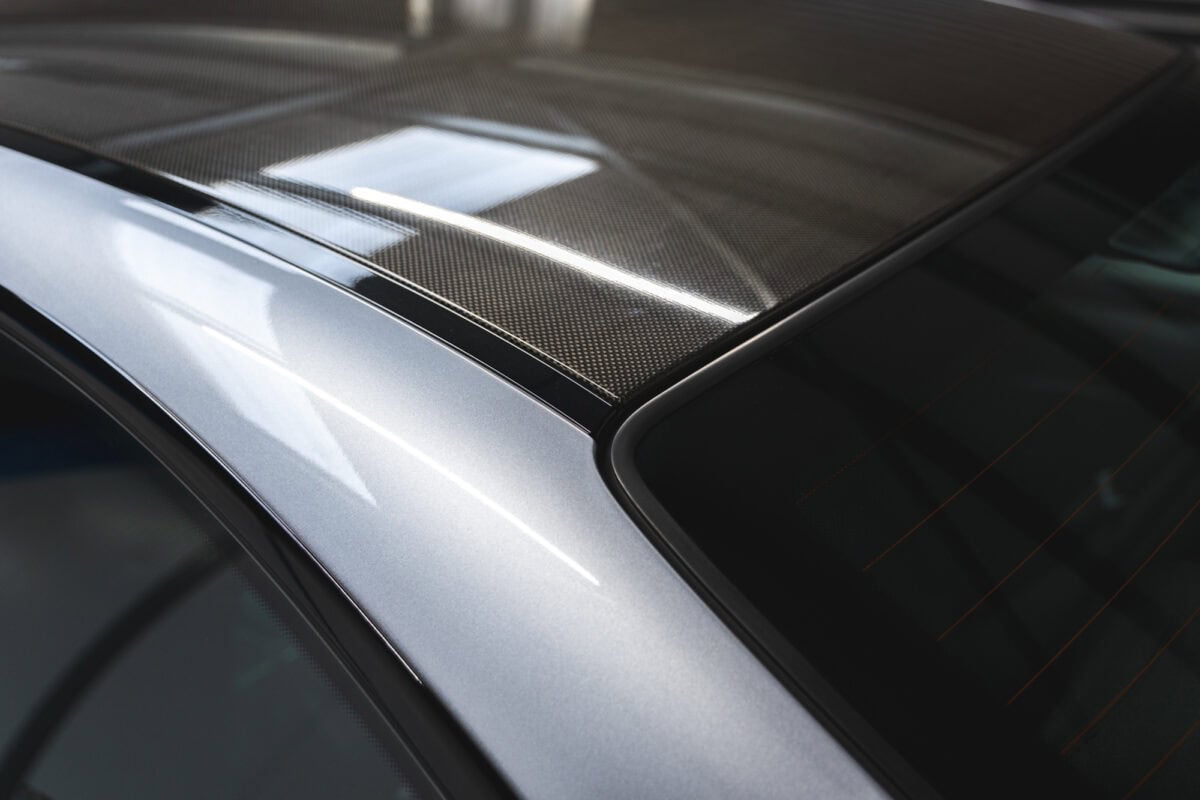 Carbon fibre roof panel of a silbergrau BMW E46 M3 CSL.