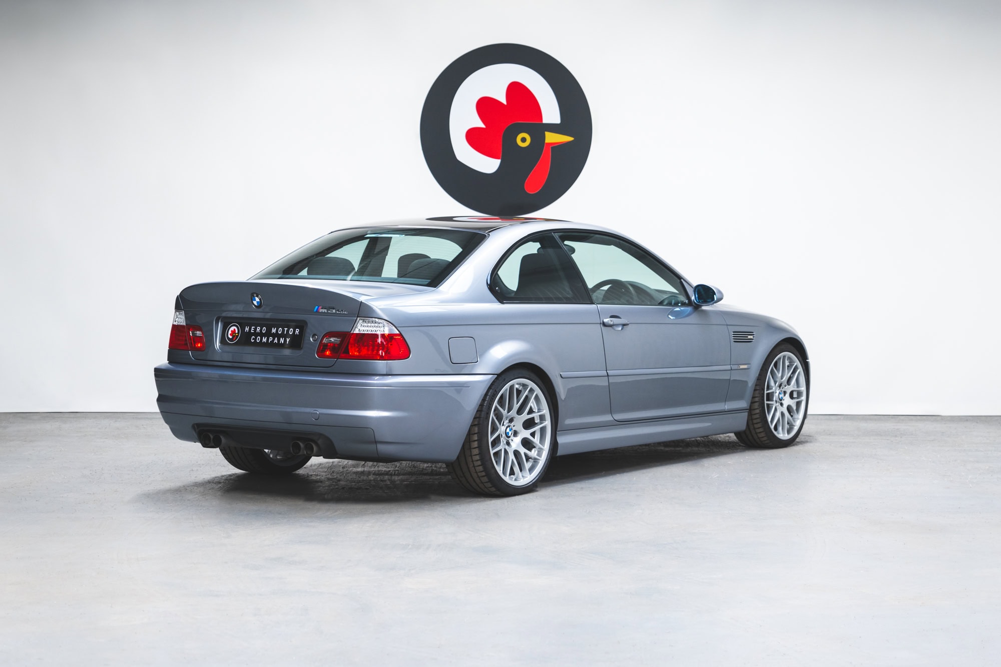 Rear offside quarter of a silbergrau BMW E46 M3 CSL for sale at Hero Motor Company.