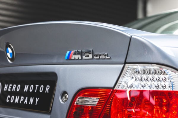 Rear M3 and CSL badge detail of a silbergrau BMW coupe.