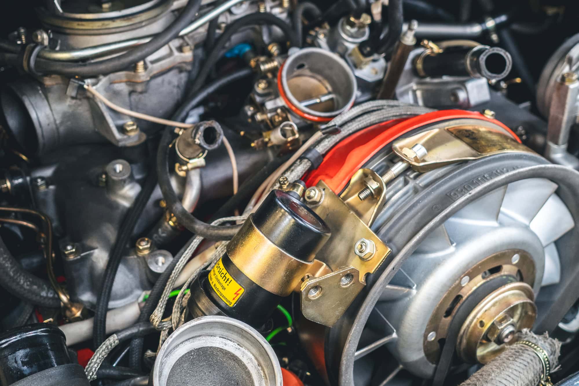 A close up of an engine from a Porsche 930 Turbo.