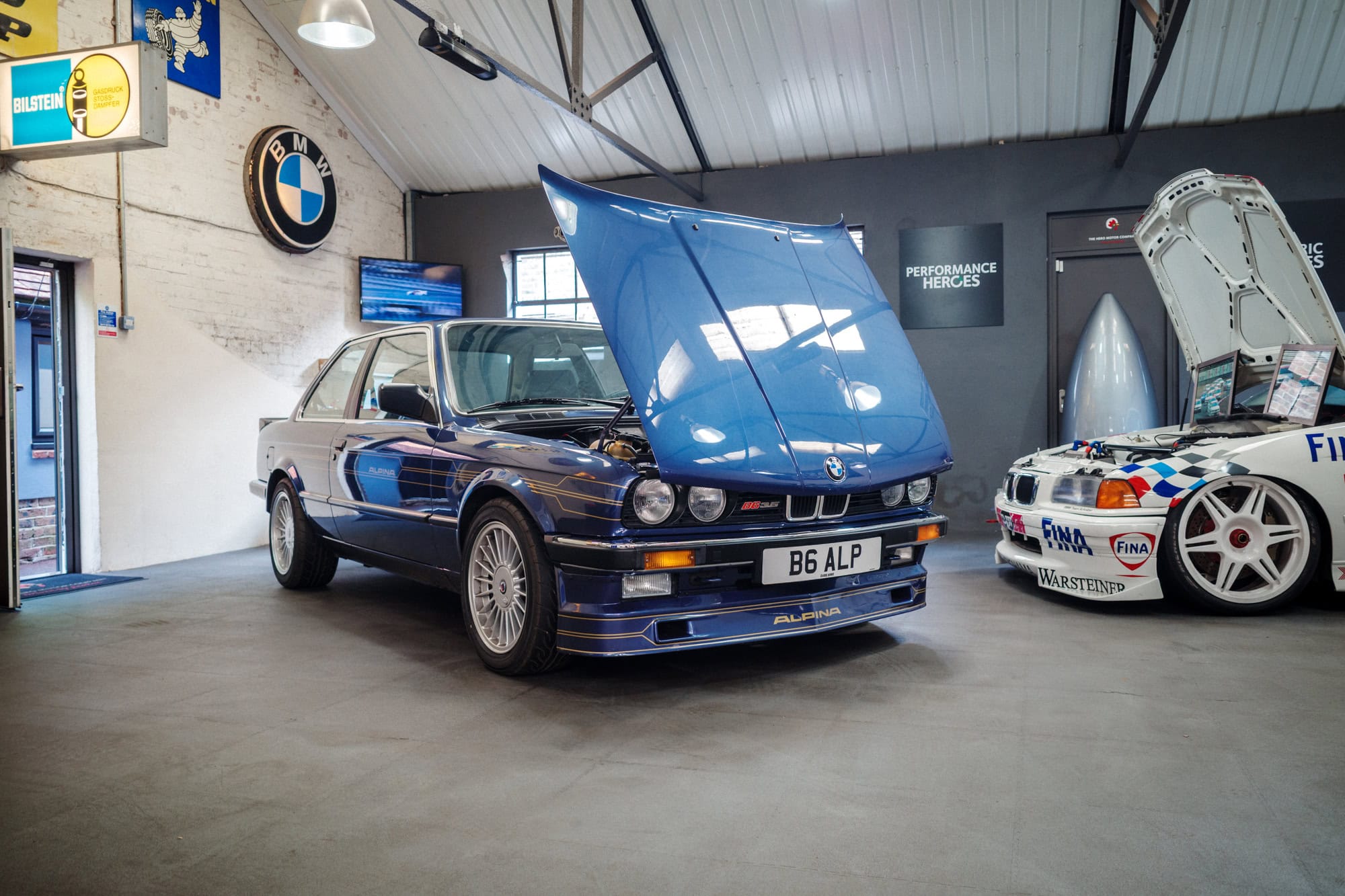 A blue E30 BMW Alpina B6 3.5.