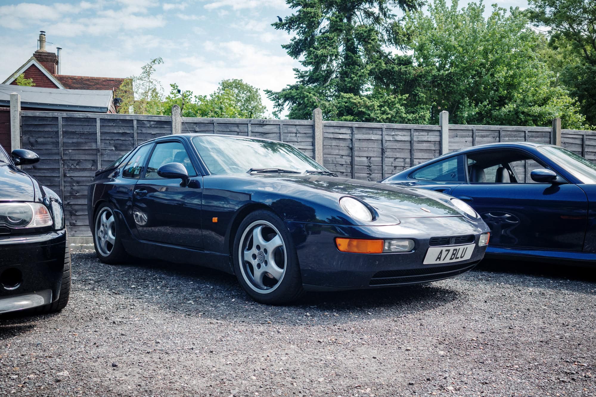 A silver Porsche 993 coupe at the hero motor company open day.