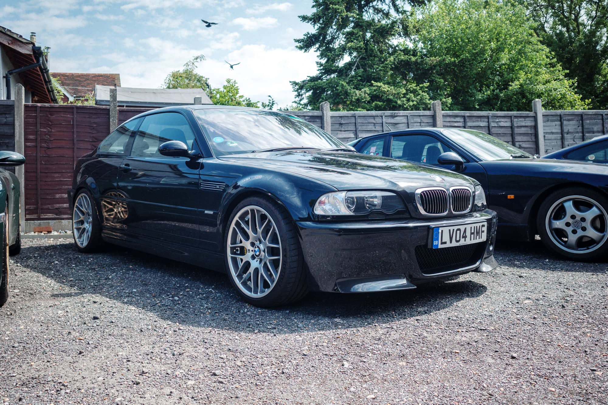 A black BMW E46 M3 CSL coupe at the hero motor company open day.