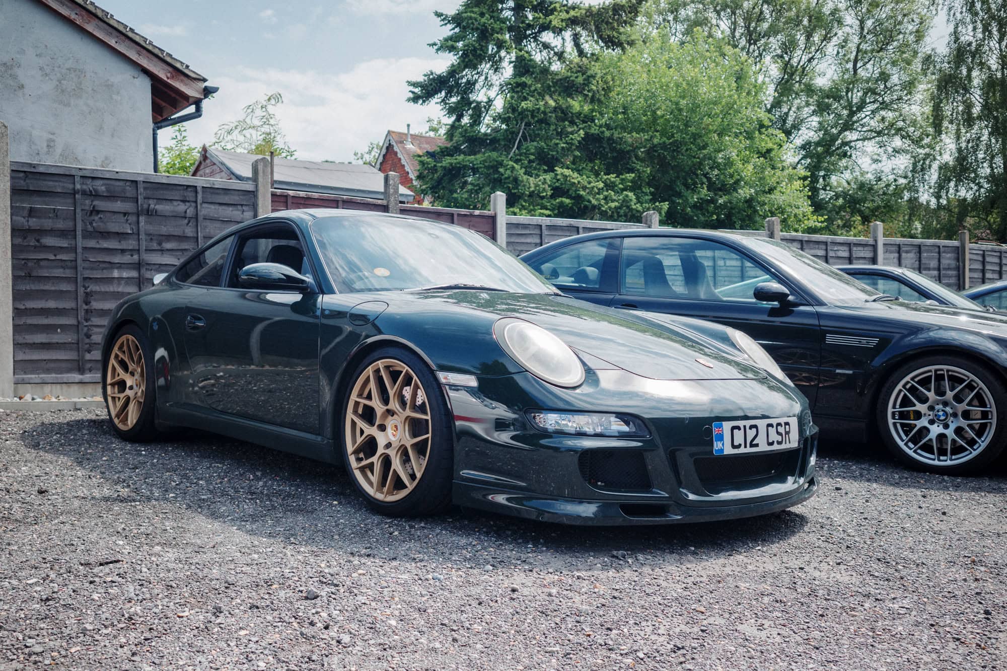 A green Porsche 997 car at the hero motor company open day.