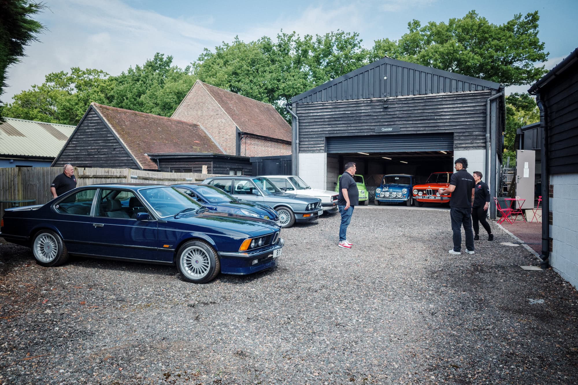 Cars from the hero collection at hero motor company out for display at an event.