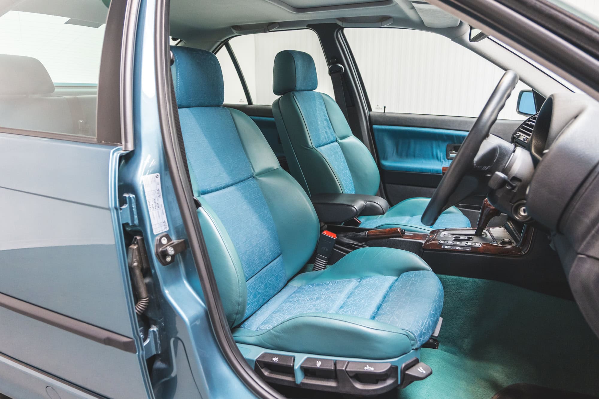 Offside interior view showing steering wheel on a BMW 1997 E36 523 TDS