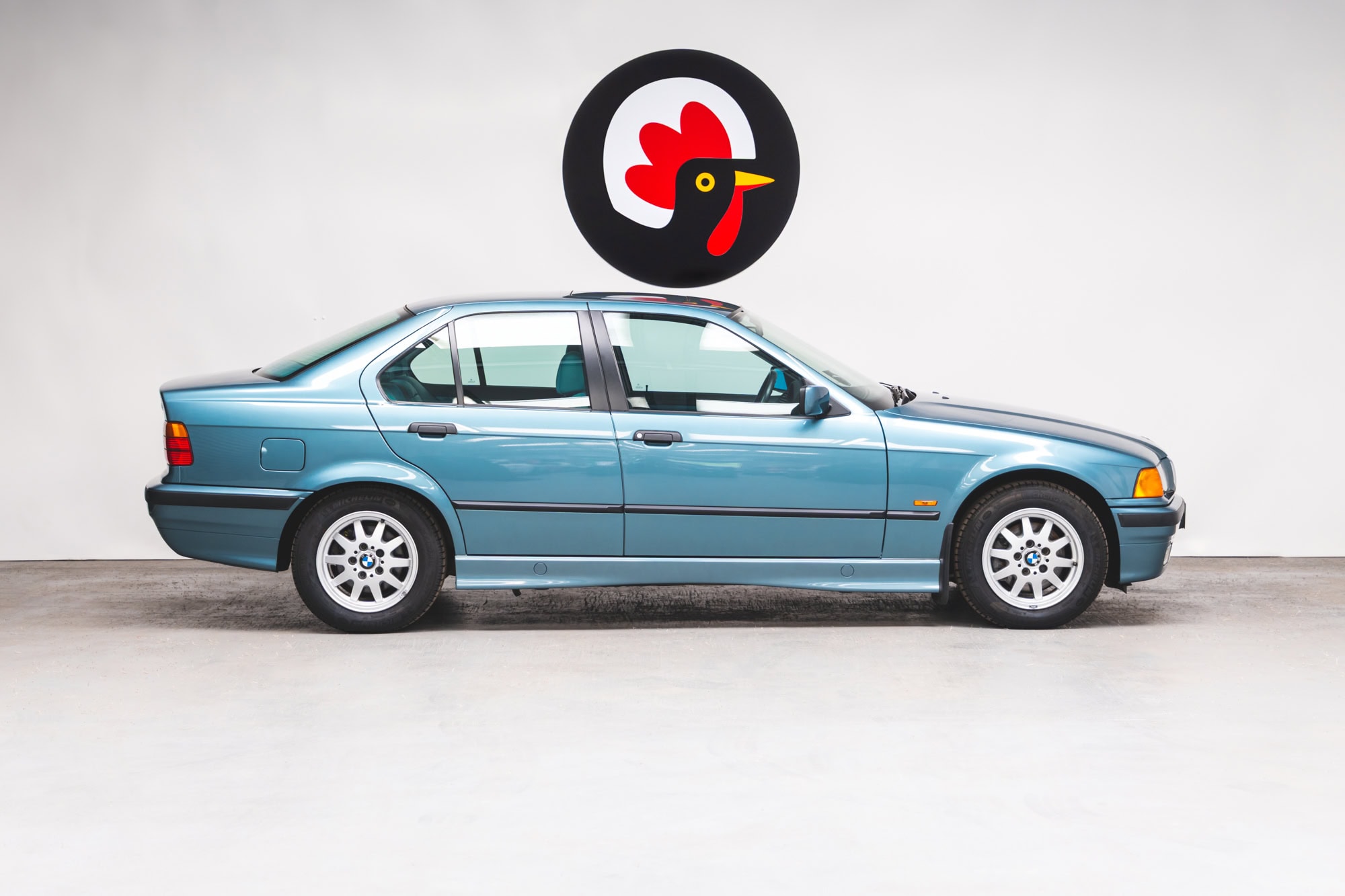 Offside exterior showing alloy wheels on Morea Green BMW 1997 E36 523 TDS