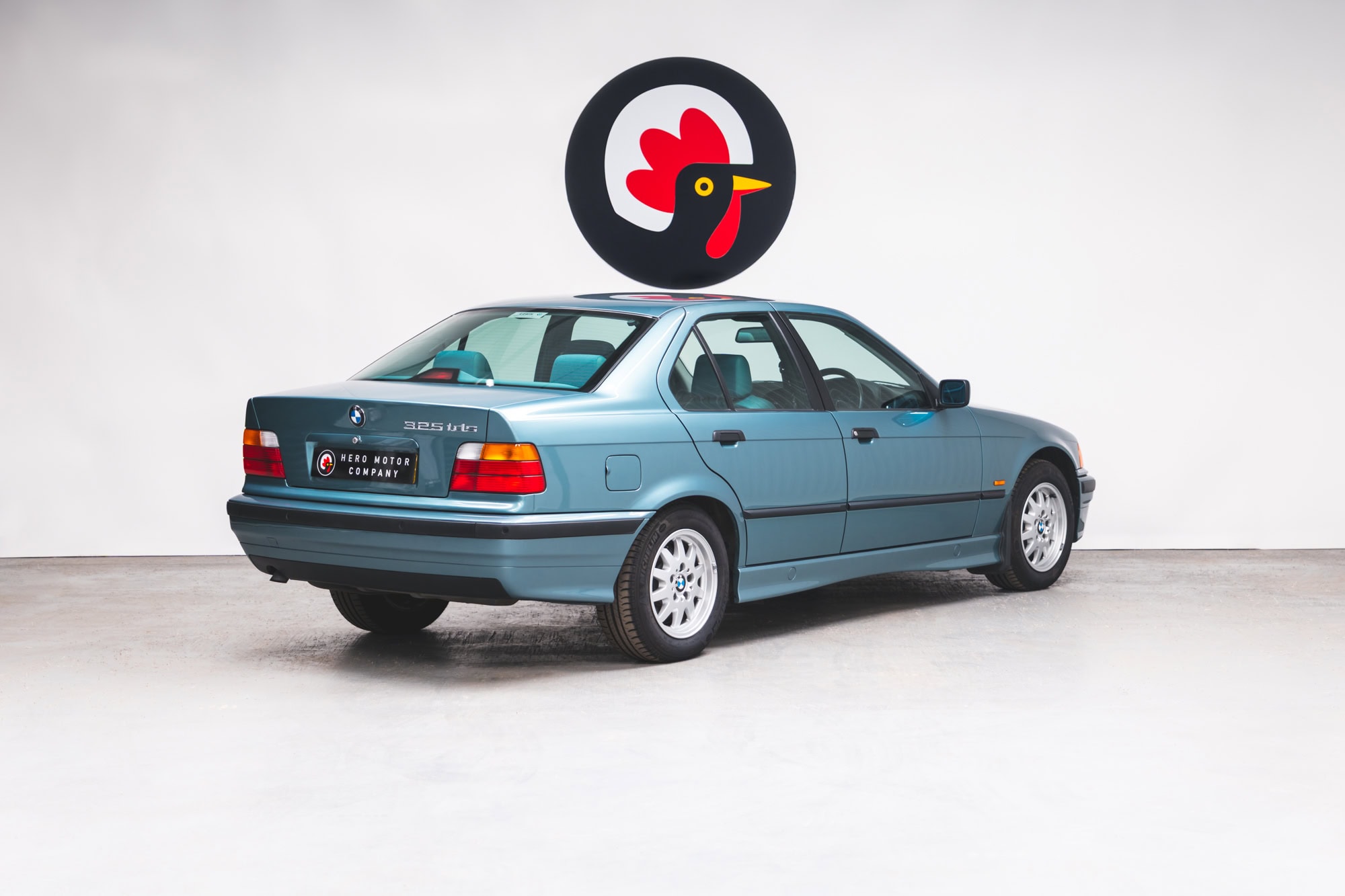 Rear exterior of a Morea Green BMW 1997 E36 523 TDS