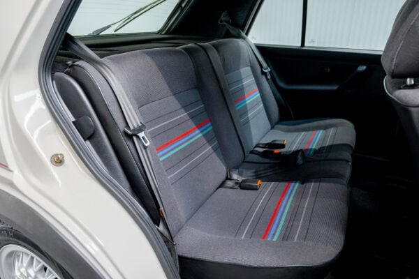 Offside interior view of rear seats and seat belts on VW Golf GTI MK2 5 Door 8V