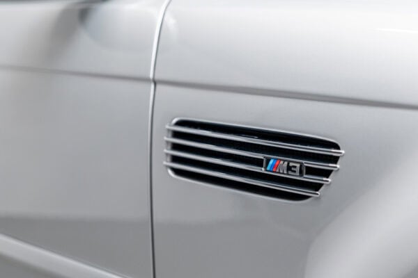 Chrome and BMW M3 badge on E46 in titan silver