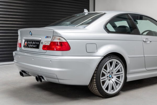 Offside rear exterior view of BMW E46 M3 titan silver and supersprint exhaust