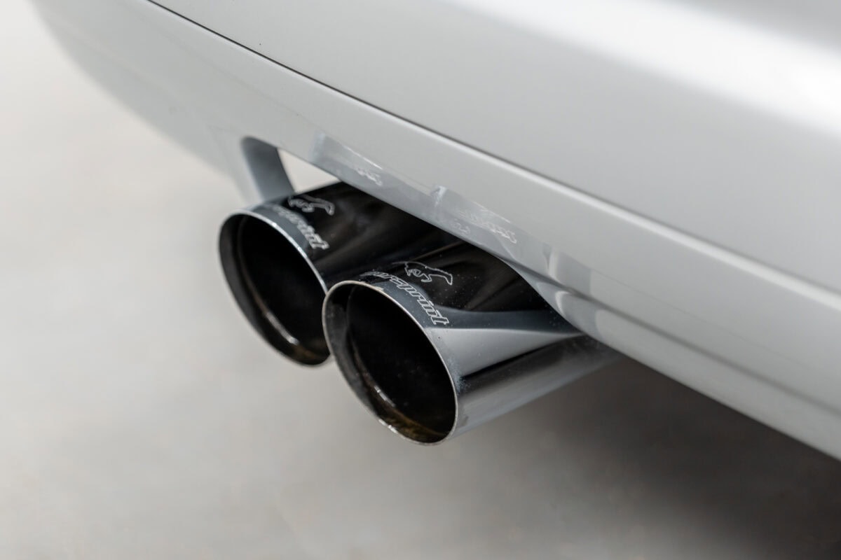 Close up view of Supersprint exhaust system on BMW E46 M3 titan silver