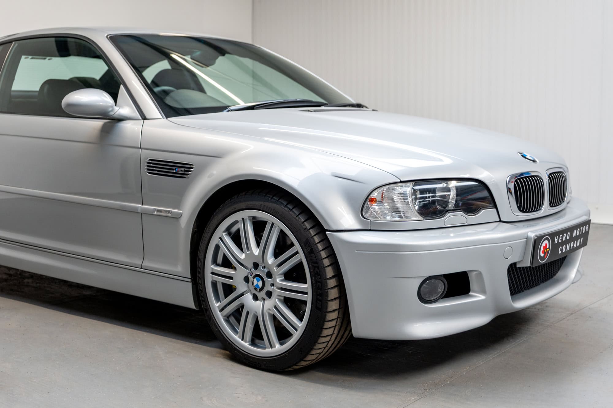 Offside exterior showing chrome trim and alloy wheel on BMW E46 M3 in titan silver