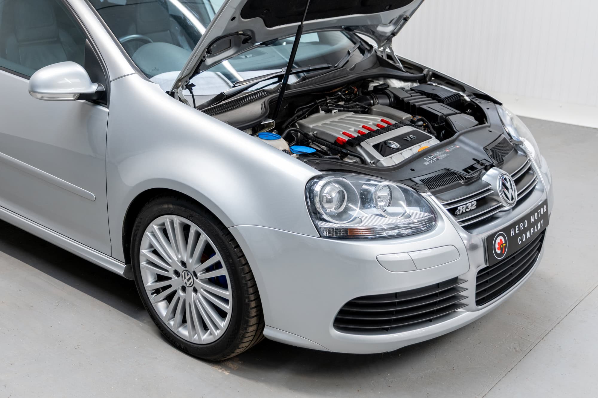 Offside exterior view bonnet open showing engine bay on Volkswagen Golf R32 Reflex Silver DSG