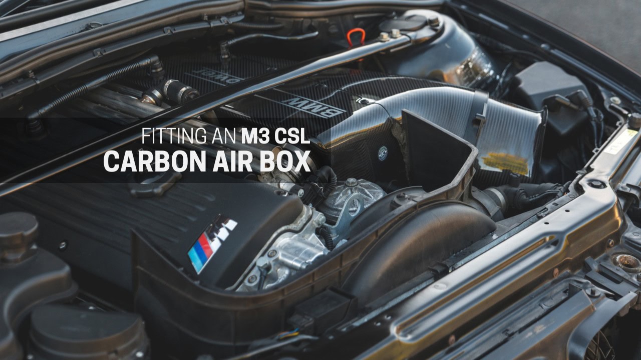 A BMW E46 M3 engine bay with Karbonius carbon air box thumbnail.