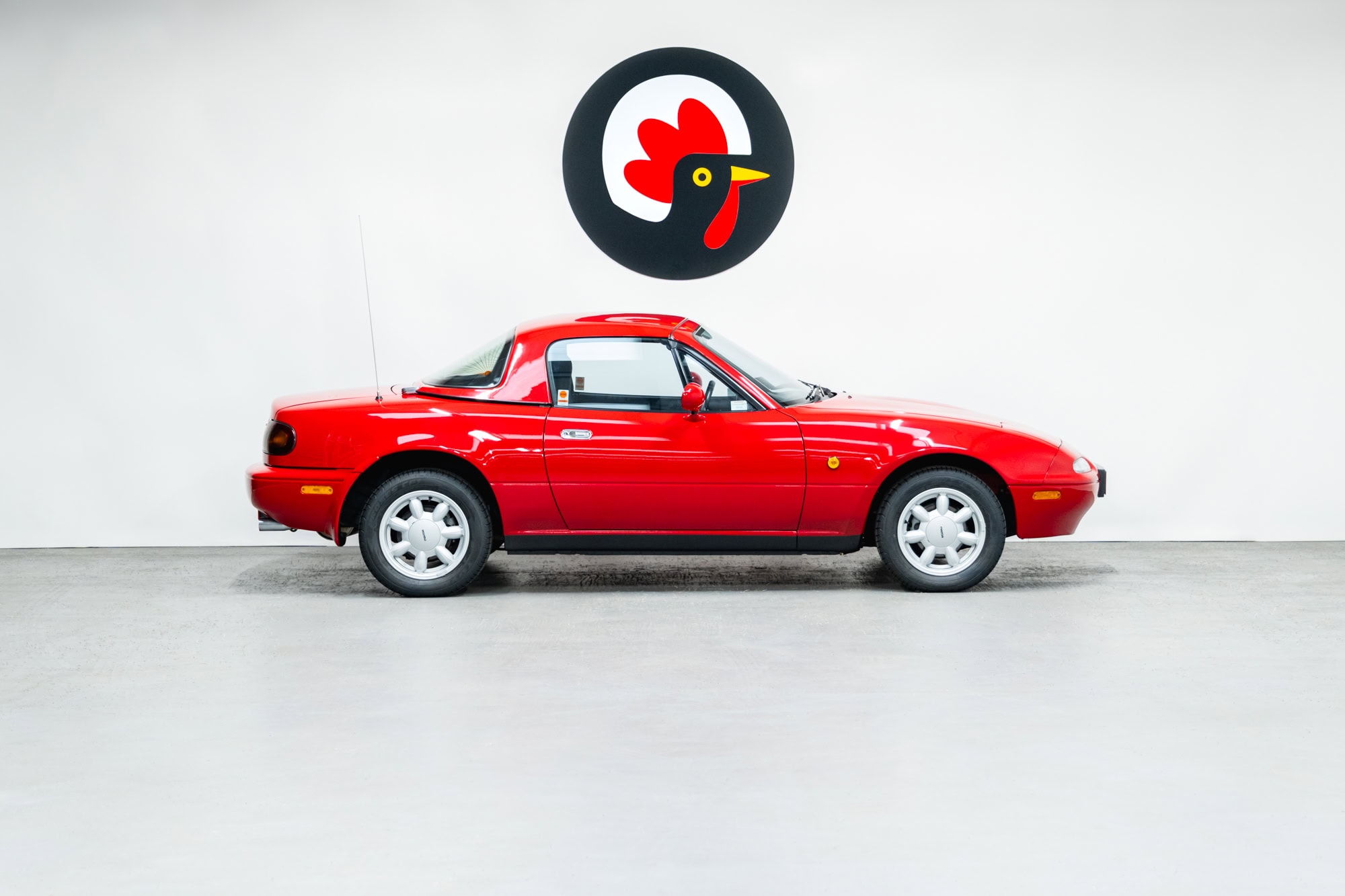 Nearside exterior of Mazda MX5 MKI Classic Red Eunos Roadster