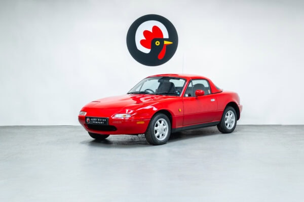 Front nearside exterior of Mazda MX5 MKI Classic Red Eunos Roadster
