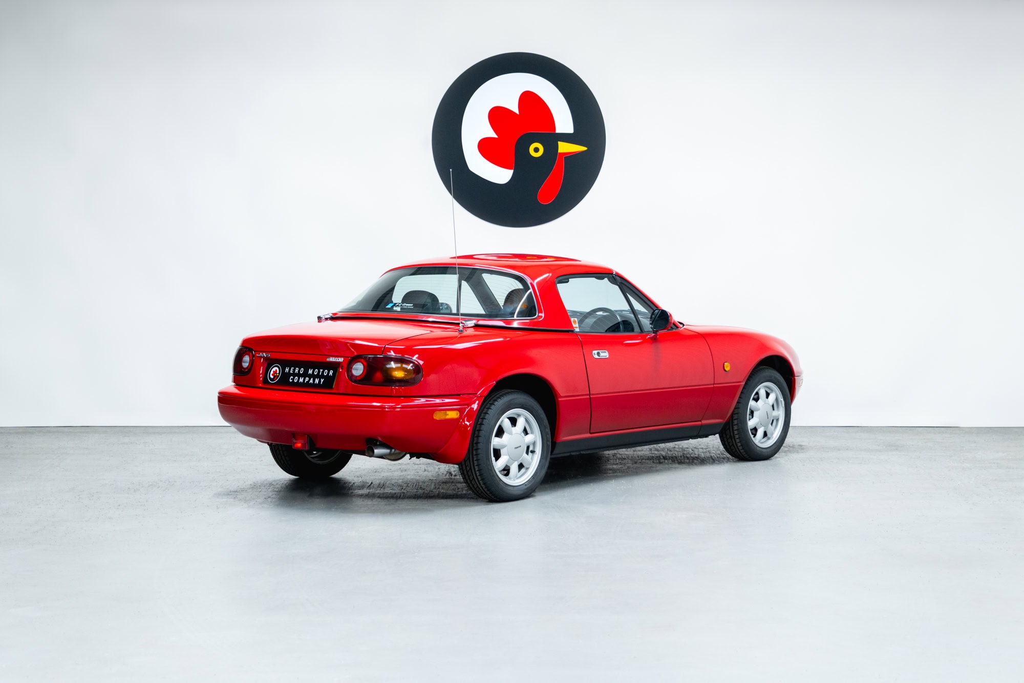 Rear offside exterior of Mazda MX5 MKI Classic Red Eunos Roadster